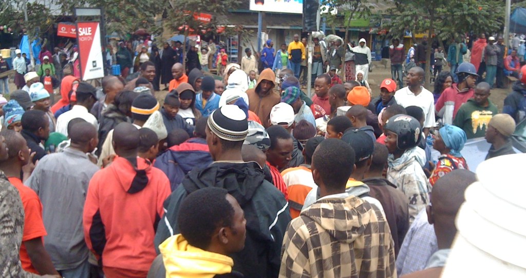 According to renowned Polish journalist Ryszard Kapuscinski, Tanzania's "bayaye" or unemployed and idle youth await the slightest street spectacle, which will instantly draw large numbers. Case in point, a truck collides with a boda-boda driver (motorcycle taxi) in Arusha town on Sokoine Road and dozens immediately gather.