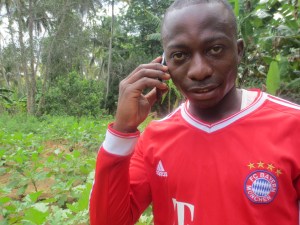 Ali Abeid calls his friend and fellow young farmer Adam from Shinyanga on Tanzania's mainland