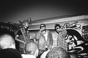 Arusha hip hop producer Daudi Bakari, aka Daz Naledge, hypes up the crowd at Saving Underground Artists (S.U.A.) event. Credit: Loic Nogues