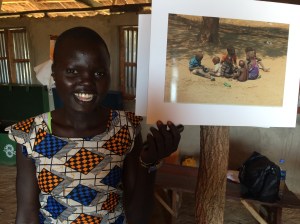 Rebecca Yar Achiek showing off one of her photos