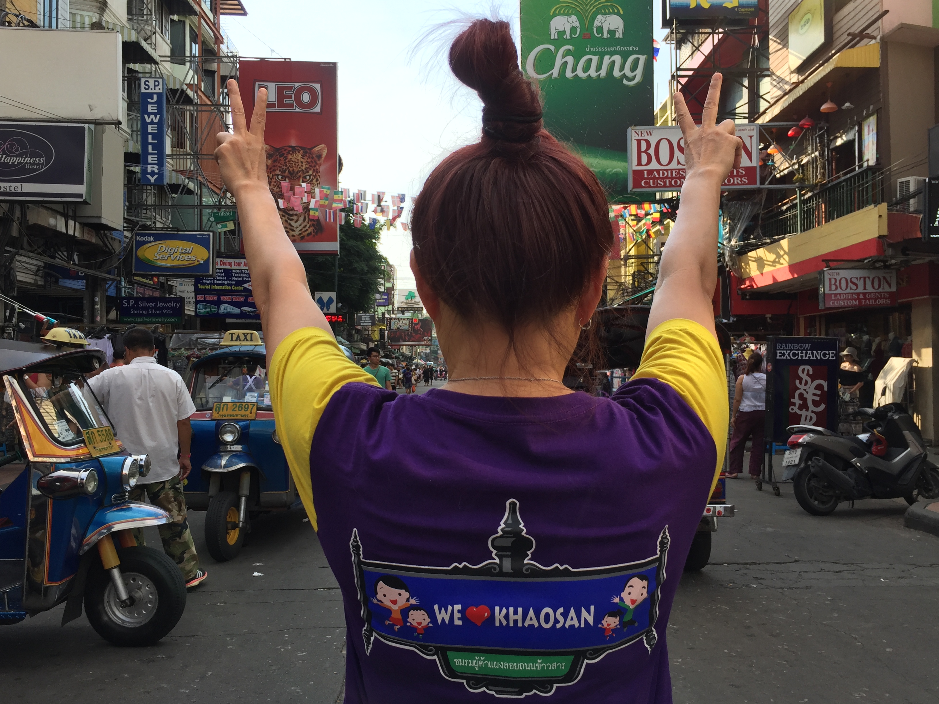 Yada Pornetrumpa on Khaosan Road wearing a We Love Khaosan tee shirt.jpg